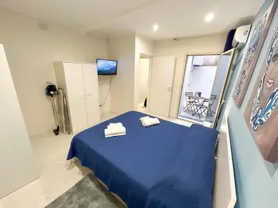 Letto o letti in una camera di La Perla di Vale