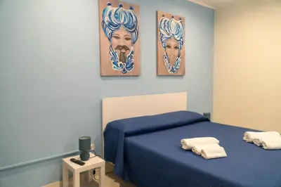 Letto o letti in una camera di La Perla di Vale