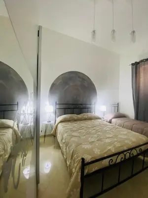 Letto o letti in una camera di Casa Ornella