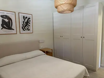 Letto o letti in una camera di Casa Bernini