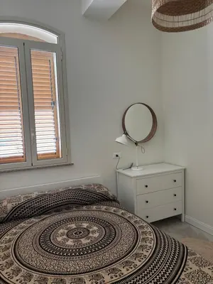 Letto o letti in una camera di Casa Bernini