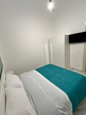 Letto o letti in una camera di Antica Dimora