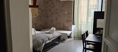 Letto o letti in una camera di DownTown art in Town