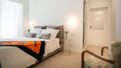 Letto o letti in una camera di La Dimora di Adone