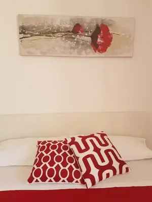 Letto o letti in una camera di La Casa di Charme