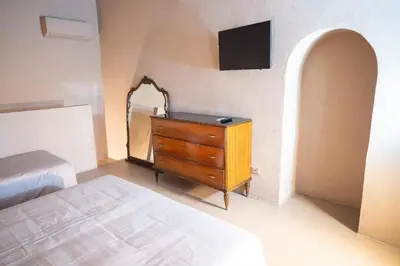Letto o letti in una camera di CASA FLORA - Noto