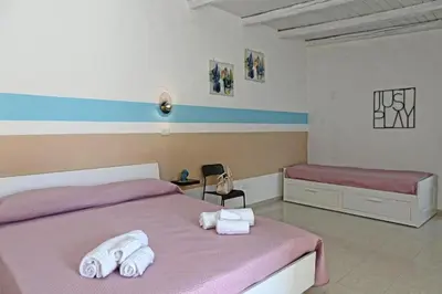 Letto o letti in una camera di Duomo Room