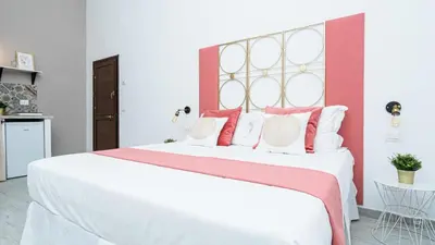 Letto o letti in una camera di Nice & Love