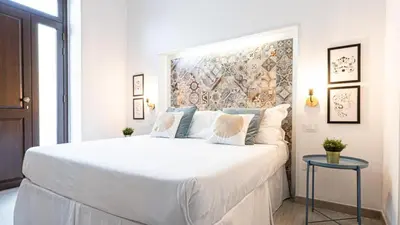 Letto o letti in una camera di Nice & Love
