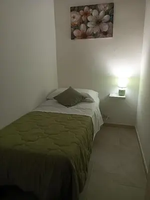 Letto o letti in una camera di SiciliAmo b&b