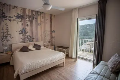 Letto o letti in una camera di La Casa del Gelsomino
