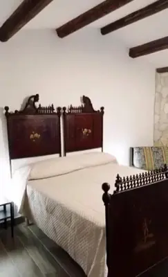 Letto o letti in una camera di La Casetta Nel Bosco Delle Nereidi