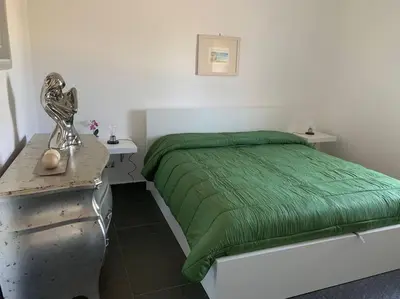 Letto o letti in una camera di Il Giardino di Marta - Casa Vacanze