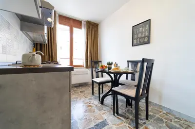Cucina o angolo cottura di GuestHost - Ortigia's Market Lovely Apartments