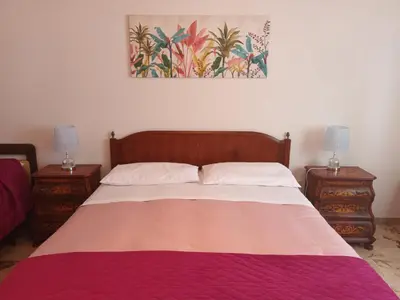 Letto o letti in una camera di Cuella's Apartment - Syracuse