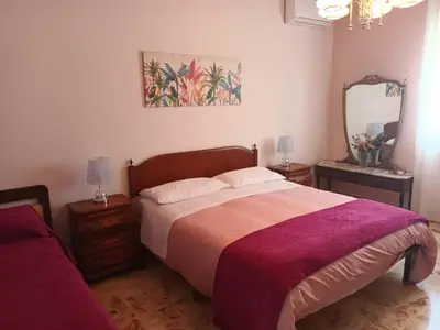 Letto o letti in una camera di Cuella's Apartment - Syracuse