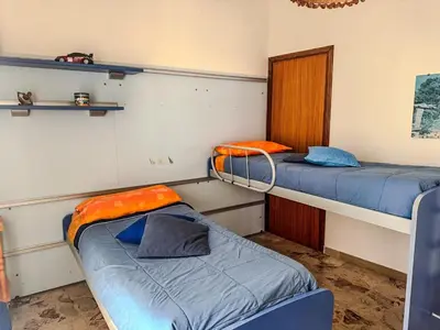 Letto o letti in una camera di Cuella's Apartment - Syracuse