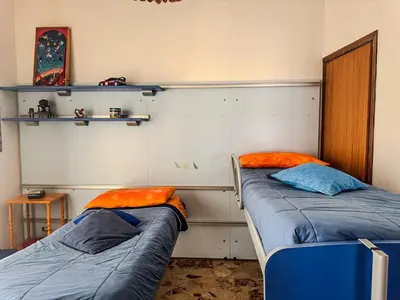 Letto o letti in una camera di Cuella's Apartment - Syracuse