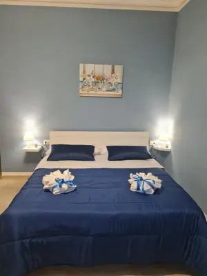Letto o letti in una camera di SiciliAmo b&b