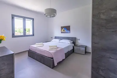 Letto o letti in una camera di White House Villa Luisa