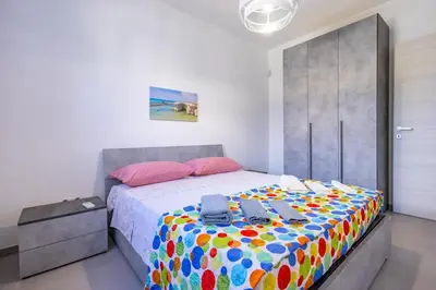 Letto o letti in una camera di White House Villa Luisa