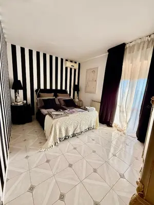 Letto o letti in una camera di Seb's Flat - Home of the Sun & Colors, Free Wi-Fi , AC, SmartTV