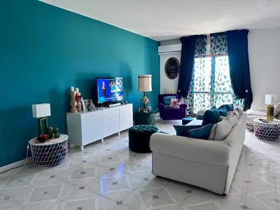 TV o dispositivi per l'intrattenimento presso Seb's Flat - Home of the Sun & Colors, Free Wi-Fi , AC, SmartTV