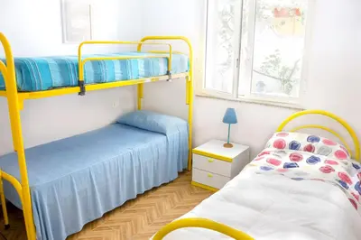 Letto o letti in una camera di Villa Trinacria