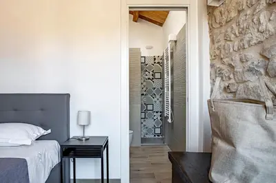 Letto o letti in una camera di Casa Teresa con vista