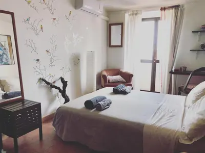 Letto o letti in una camera di Stanza sul Mare
