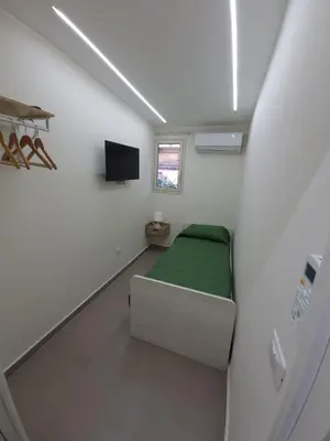 TV o dispositivi per l'intrattenimento presso GSG Room & Relax - Green House