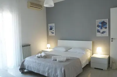 Letto o letti in una camera di La perla del sud