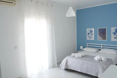 Letto o letti in una camera di La perla del sud