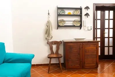 Area soggiorno di GuestHost - Quaint Ortigia Center Apartment