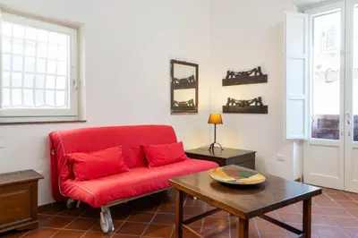 Area soggiorno di GuestHost - Quaint Ortigia Center Apartment