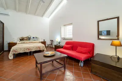 Letto o letti in una camera di GuestHost - Quaint Ortigia Center Apartment