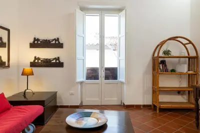 Area soggiorno di GuestHost - Quaint Ortigia Center Apartment