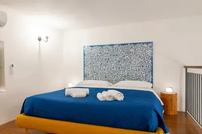 Letto o letti in una camera di GuestHost - Aretusa Suite - Ortigia Historic Gem