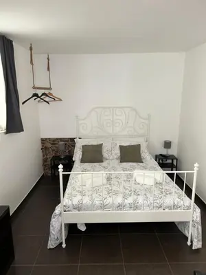 Letto o letti in una camera di Marigiu home
