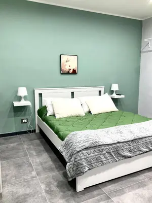 Letto o letti in una camera di Siculahome23