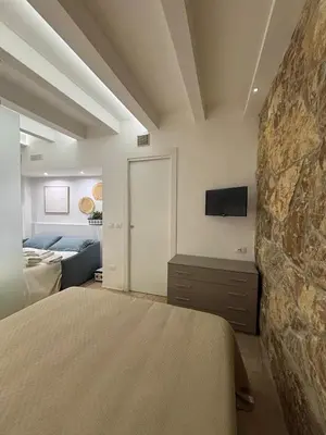 Letto o letti in una camera di Dimora Resalibera