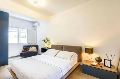 Letto o letti in una camera di Villa Arenella by Villa Plus
