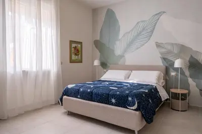 Letto o letti in una camera di Gianna e Mimmo Apartments with Garden by Wonderful Italy