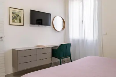 Letto o letti in una camera di Gianna e Mimmo Apartments with Garden by Wonderful Italy