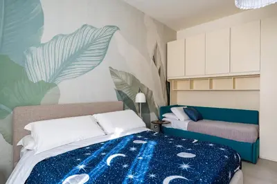 Letto o letti in una camera di Gianna e Mimmo Apartments with Garden by Wonderful Italy