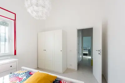 Letto o letti in una camera di Villetta Argonauti con Piscina by Wonderful Italy