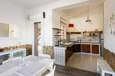 Cucina o angolo cottura di Villetta Argonauti con Piscina by Wonderful Italy