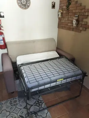 Letto o letti in una camera di Casa d'amici