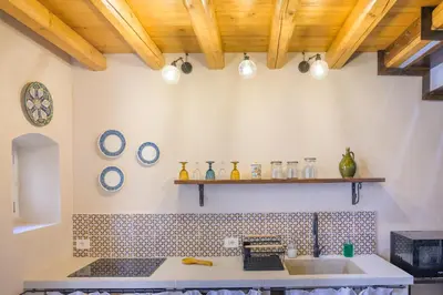 Cucina o angolo cottura di Appartamenti Vista San Giorgio - Pomelia