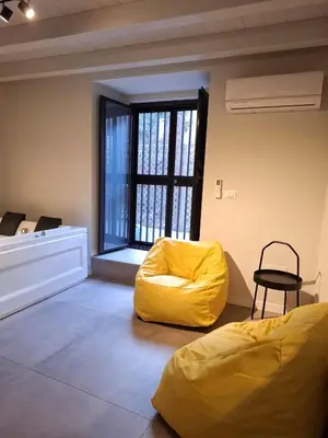 Letto o letti in una camera di Moon Art design unico e vasca idromassaggio doppia